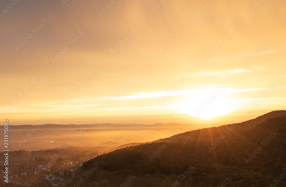 Sunset over village Steinbergen in Germany