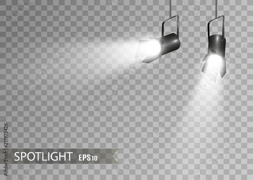 A spotlight shines on the stage. Light from a lamp or a spotlight. Illuminated scene. Podium in the spotlight.