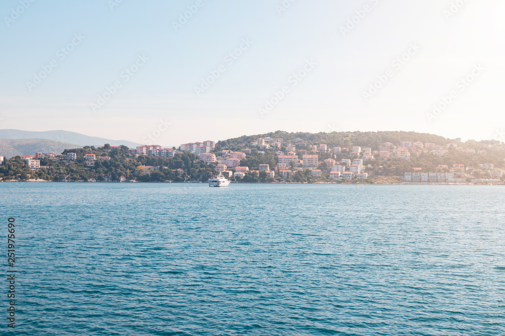Beautiful View at town Okrug Gornji from boat in the Adriatic sea at sunny summer morning