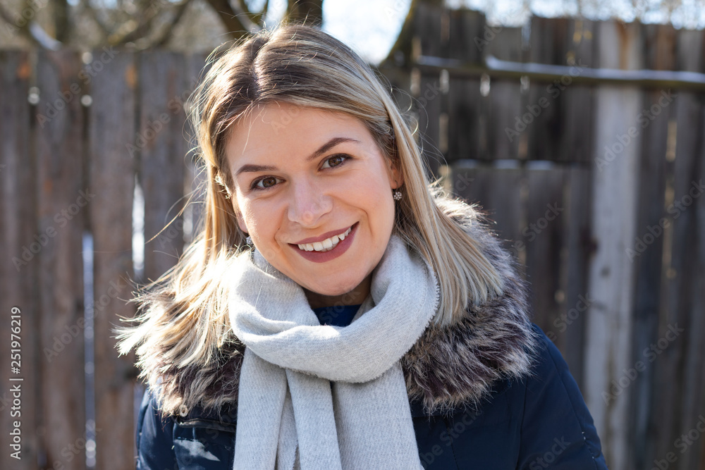 Portrait - smiling woman on a winter day Portrait - smiling woman on a winter day