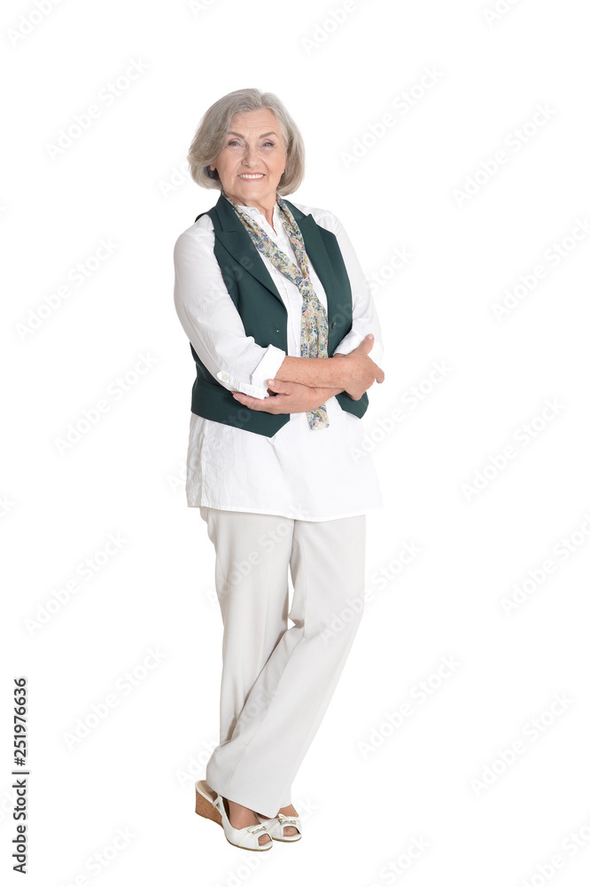 Full length, serious senior woman posing, isolated Full length, serious senior woman posing, isolated