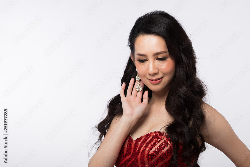 Portrait of Miss Pageant Beauty Contest in Red sequin Evening Ball Gown long dress with sparkle light Diamond Crown, Asian Woman fashion make up black hair style, studio lighting white background Portrait of Miss Pageant Beauty Contest in Red sequin Evening Ball Gown long dress with sparkle light Diamond Crown, Asian Woman fashion make up black hair style, studio lighting white background