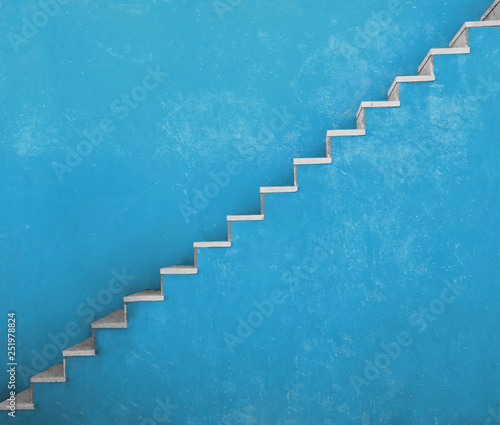 Blue wall with stairs texture background, minimalistic style for base image for posters, banners or covers, trivial design and simplicity is a trendy key for graphic arts, bright deep full color