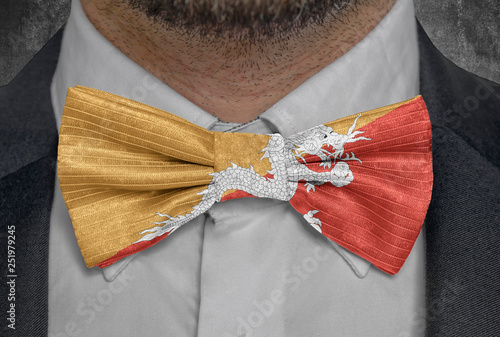 National flag of Bhutan on bowtie business man suit photo