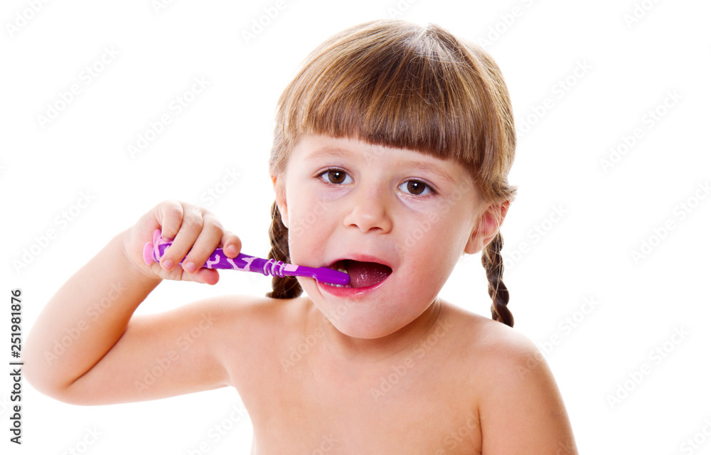 dental hygiene. happy little girl brushing her teeth dental hygiene. happy little girl brushing her teeth