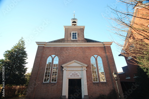 Small reformed church from 1726 in the center of Voorburg in the Netherlands photo