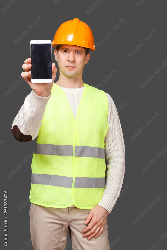 the man in a helmet with phone