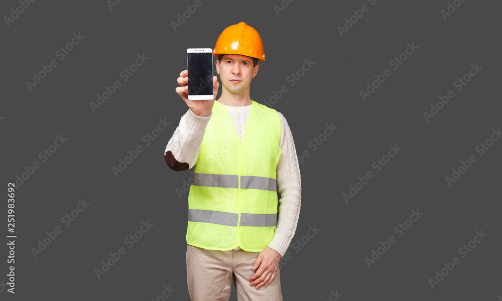 the man in a helmet with phone the man in a helmet with phone