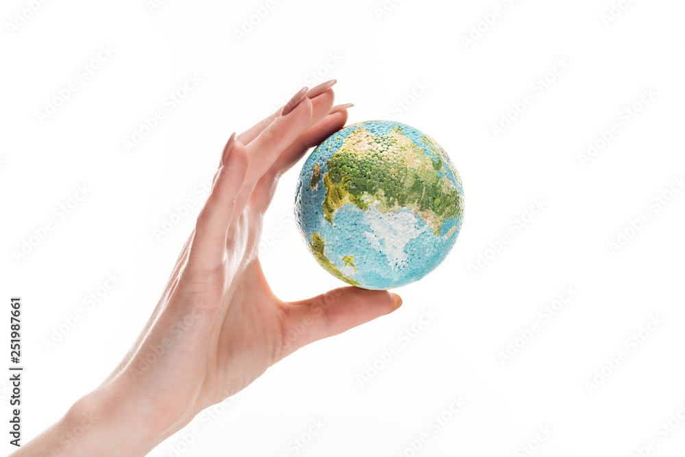 partial view of female hand with earth model isolated on white, global warming concept partial view of female hand with earth model isolated on white, global warming concept
