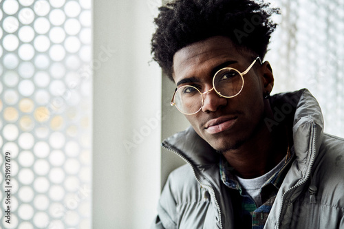 Portrait of young man wearing eyeglasses