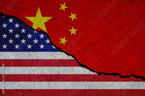 Photography united states and china flags painted over cracked concrete wall