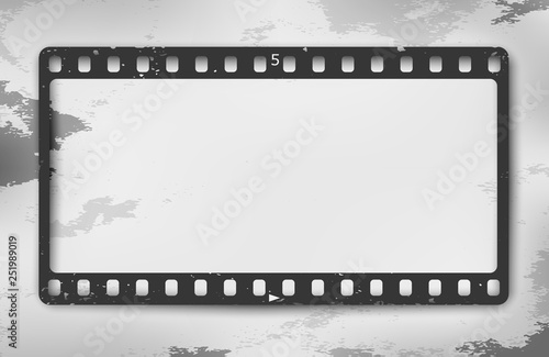 Black grunge film strip with shadow is on stained background. Vector illustration