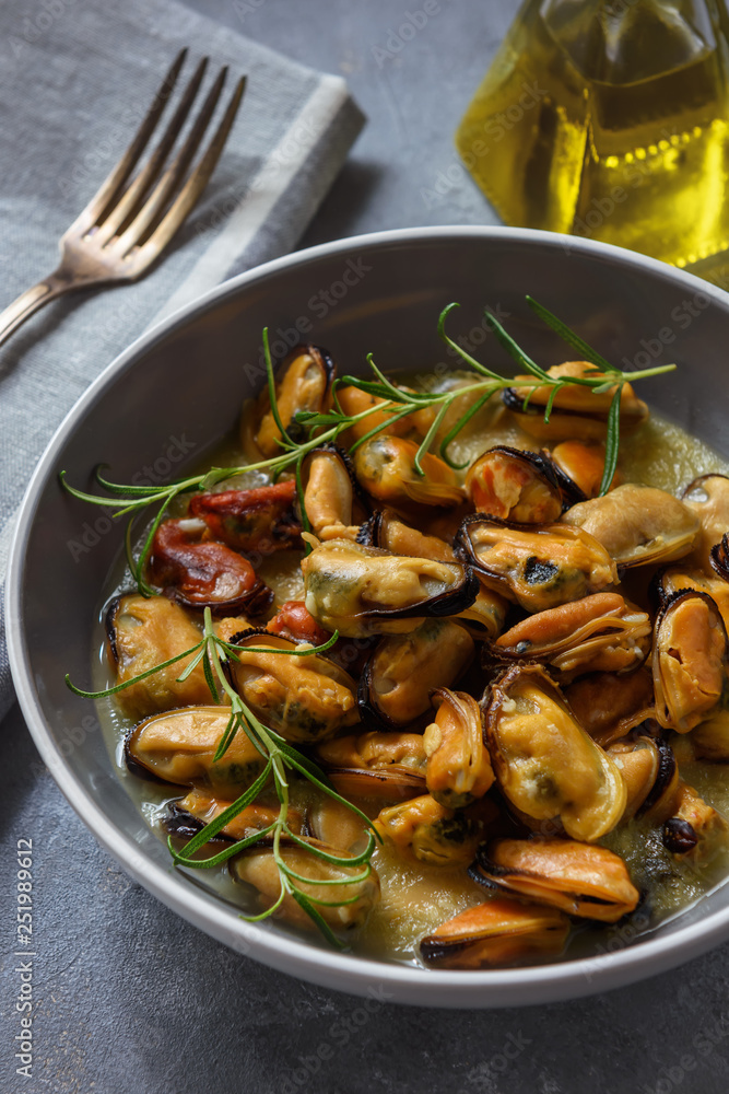 Mussels cooked with garlic, lemon and rosemary. Mussels cooked with garlic, lemon and rosemary.