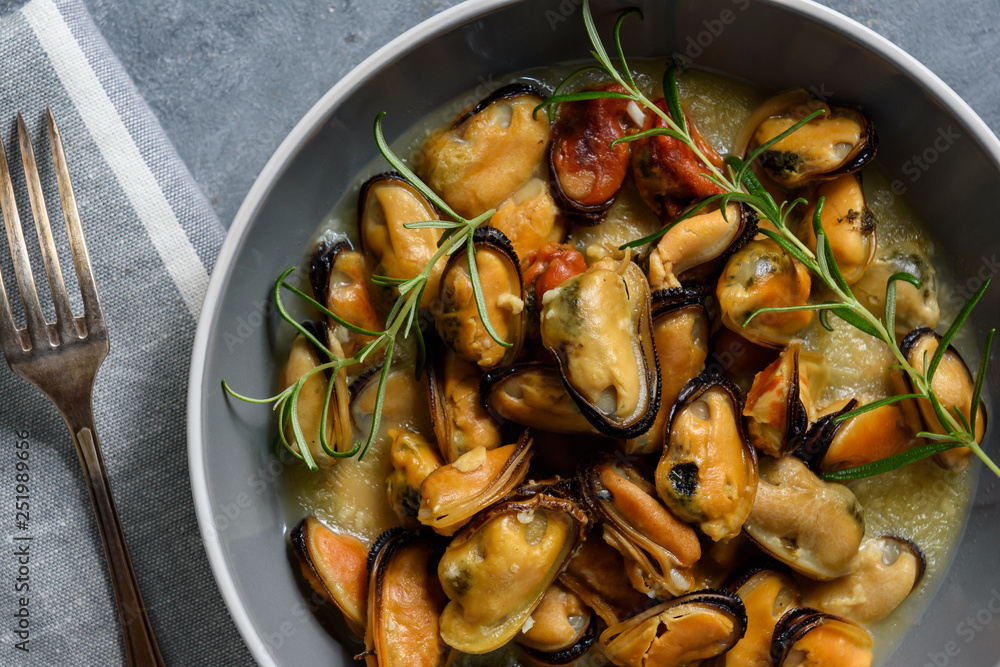 Mussels cooked with garlic, lemon and rosemary. Mussels cooked with garlic, lemon and rosemary.