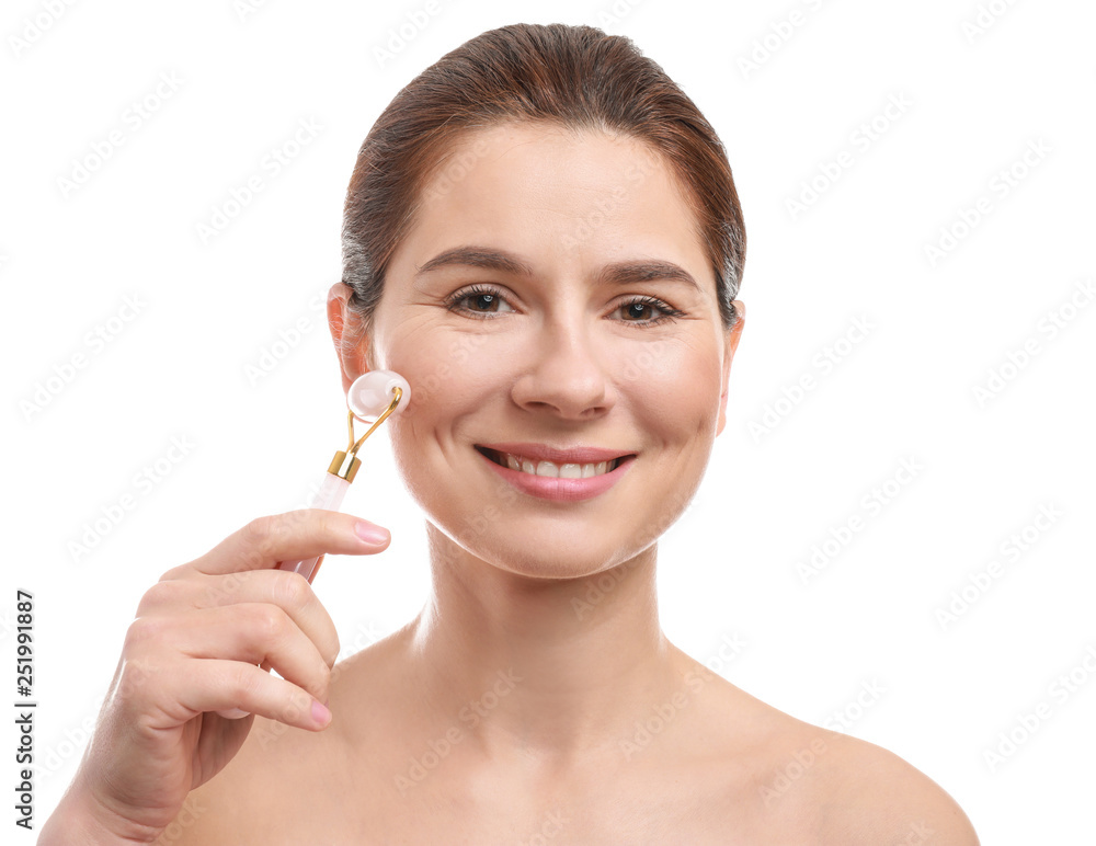 Woman with facial massage tool on white background Woman with facial massage tool on white background