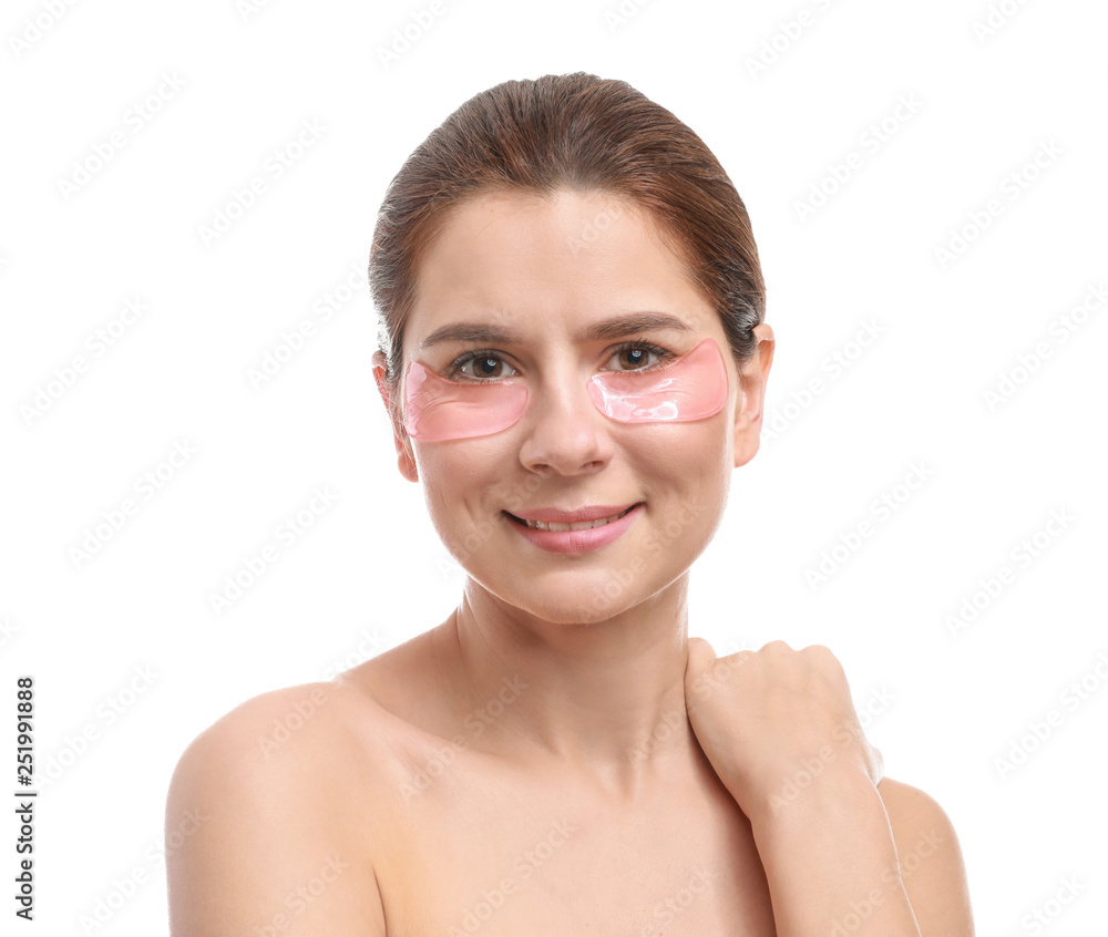 Woman with under-eye patches on white background Woman with under-eye patches on white background