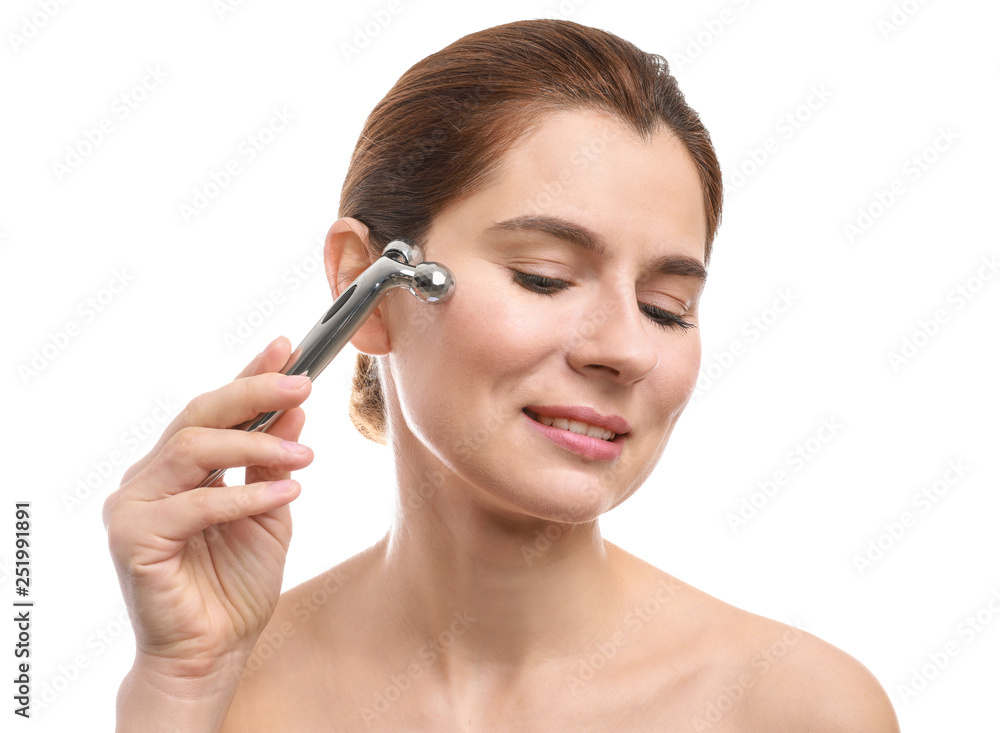 Woman with facial massage tool on white background Woman with facial massage tool on white background