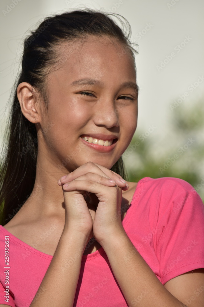Pretty Asian Teenager Girl Praying