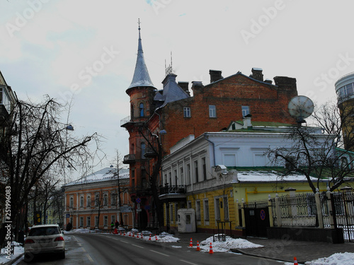 Old house in Europe red .Street view from gateway in Kiev, Ukraine.