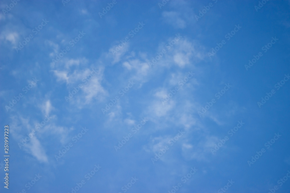Obraz premium Blue sky background with white clouds
