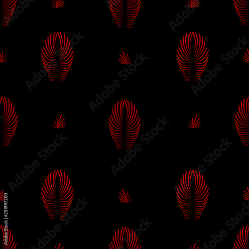 dark red leaf ornament over a dark gray color