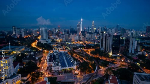 4K Cinematic Zooming In Time Lapse Footage of Kuala Lumpur city skyline taken from TNB 2 Building near KL Sentral. photo