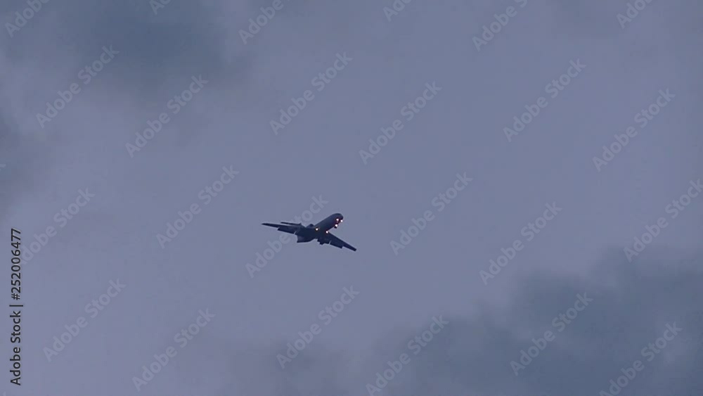 The aircraft is landing at night with lights on The aircraft is landing at night with lights on