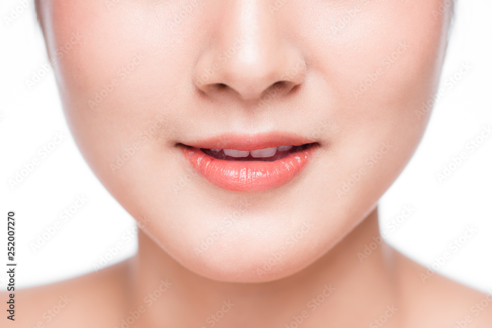 Young asian woman close up. Perfect natural lip makeup Young asian woman close up. Perfect natural lip makeup