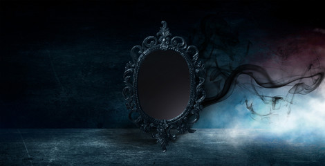 Mirror magic, fortune telling and fulfillment of desires. Fantasy with a mirror, dark room, magical power, night view.