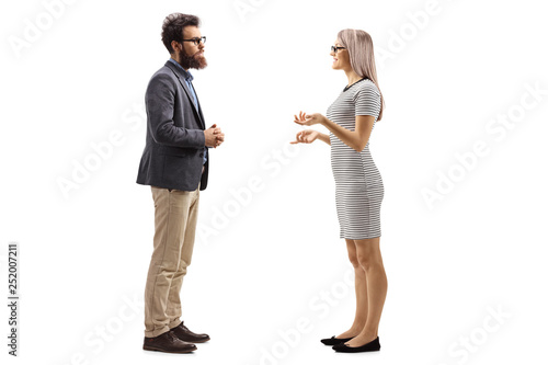 Man and woman standing and talking photo
