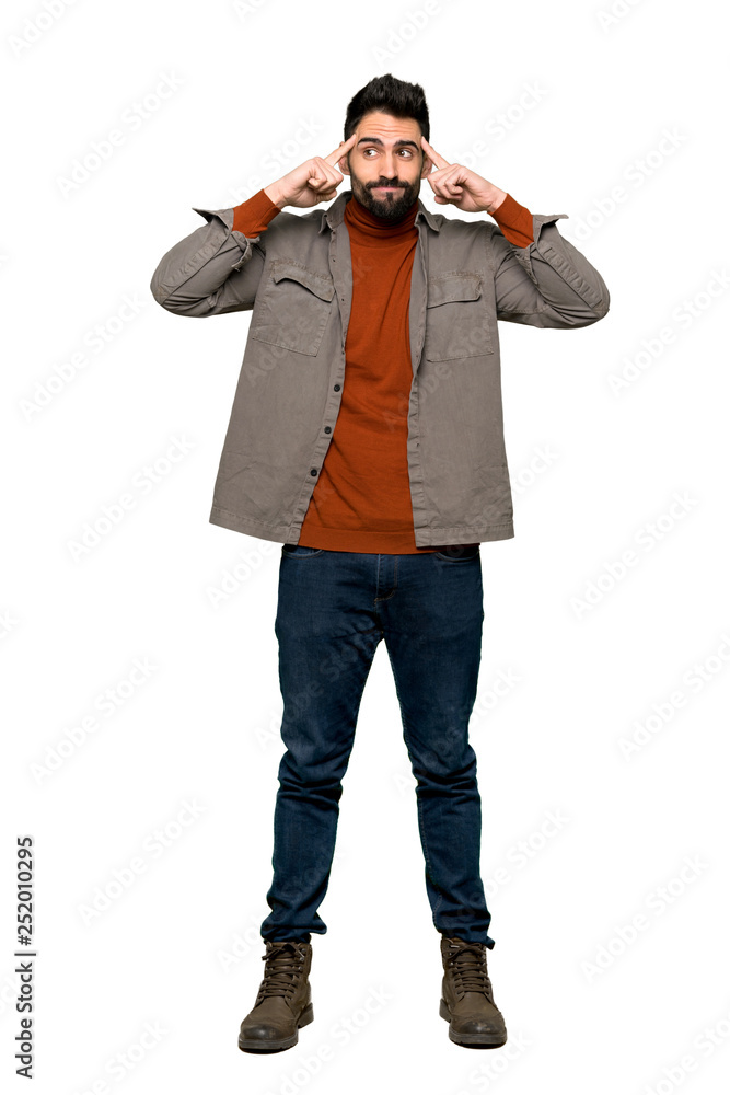 Full-length shot of Handsome man with beard having doubts and thinking on isolated white background