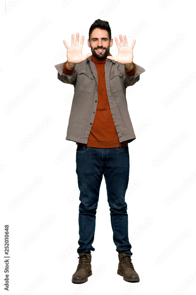 Full-length shot of Handsome man with beard counting ten with fingers on isolated white background Full-length shot of Handsome man with beard counting ten with fingers on isolated white background