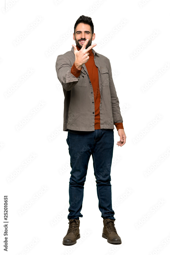 Full-length shot of Handsome man with beard happy and counting three with fingers on isolated white background Full-length shot of Handsome man with beard happy and counting three with fingers on isolated white background