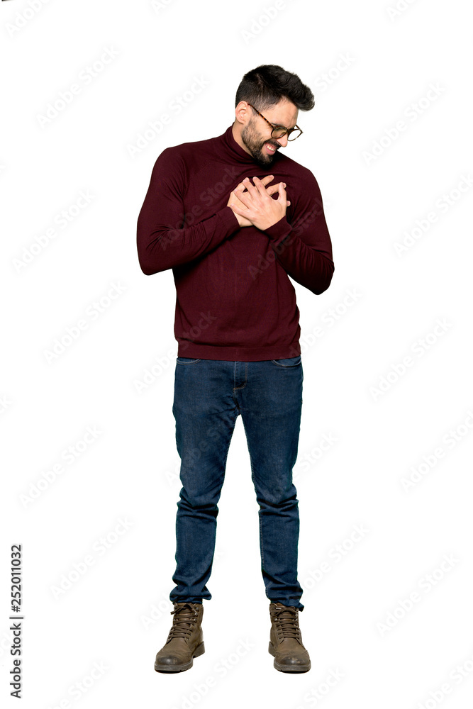 Full-length shot of Handsome man with glasses having a pain in the heart on isolated white background Full-length shot of Handsome man with glasses having a pain in the heart on isolated white background