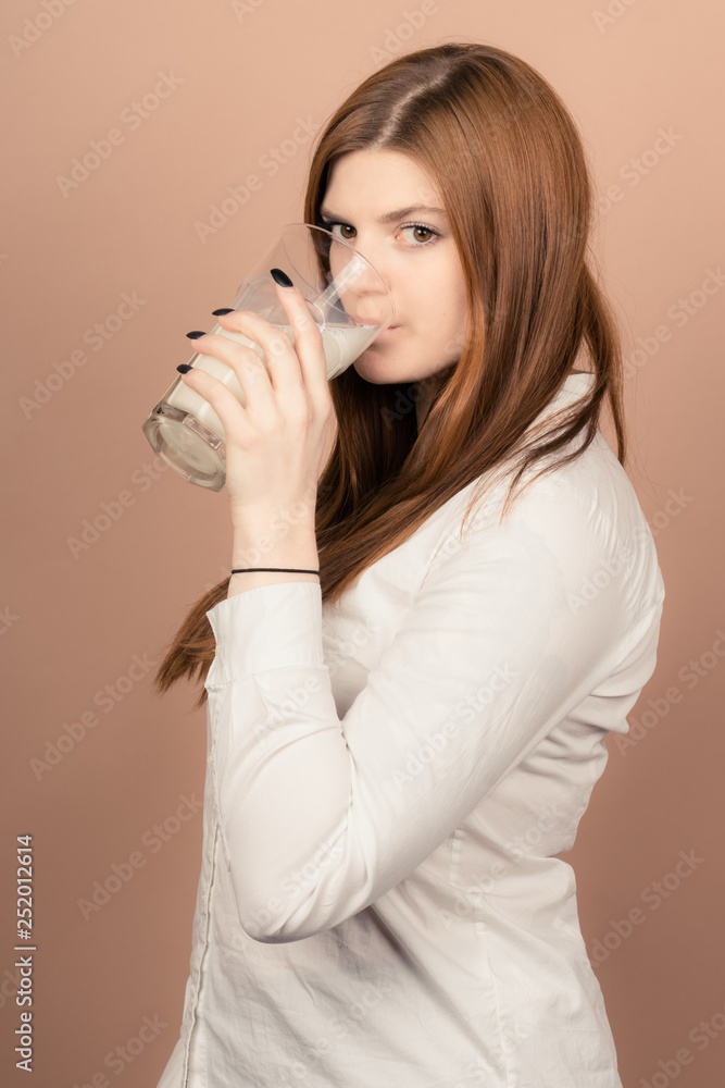 girl drinks milk and is happy girl drinks milk and is happy