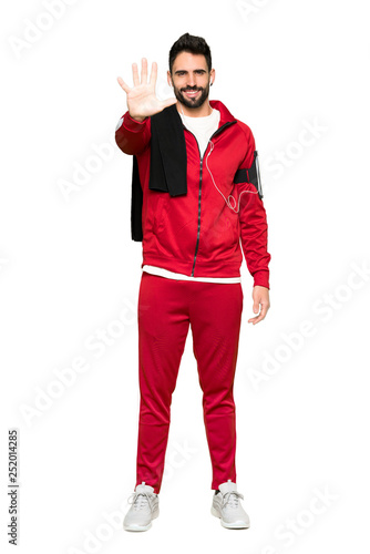 Full-length shot of Handsome sportman counting five with fingers on isolated white background
