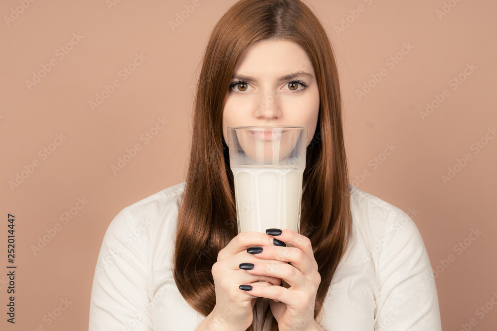 girl drinks milk and is happy girl drinks milk and is happy