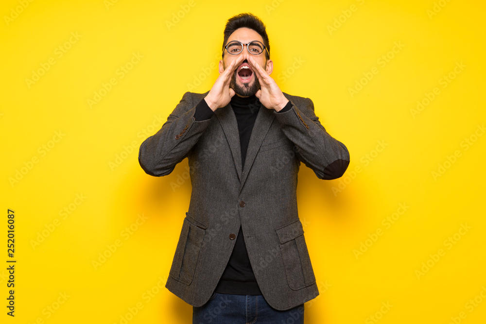Handsome man with glasses shouting and announcing something Handsome man with glasses shouting and announcing something