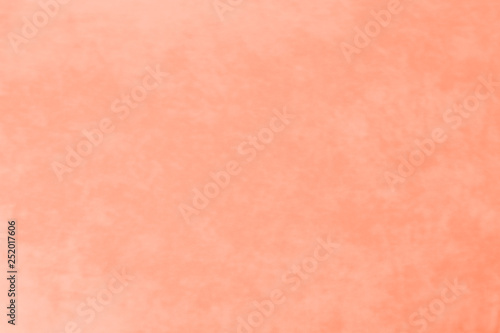 It is a background of fabric of beautiful gentle pink or light-red color of non-uniform texture.