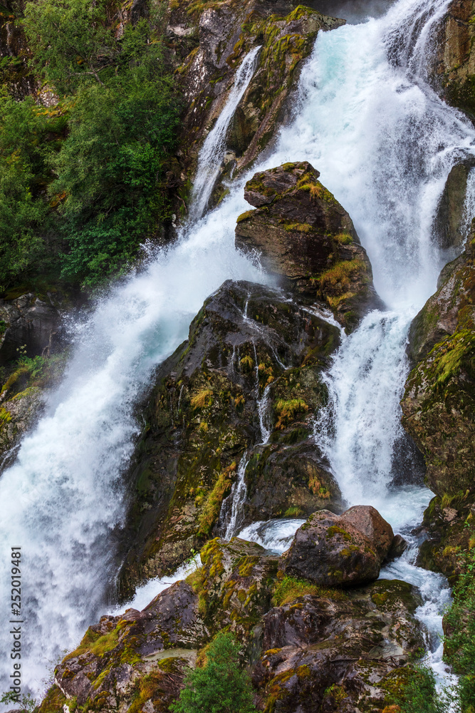 waterfall in mountains of Norway in the summer waterfall in mountains of Norway in the summer