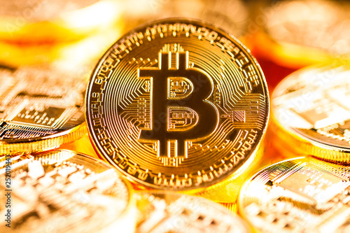 Stack of golden bitcoins. Business background concept with golden bitcoin criptocurrency