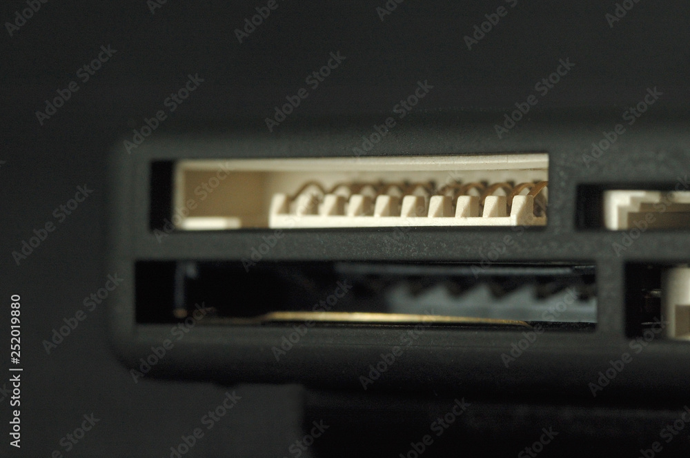 Card reader. Ports for various memory card formats closeup. Shallow depth of field Card reader. Ports for various memory card formats closeup. Shallow depth of field