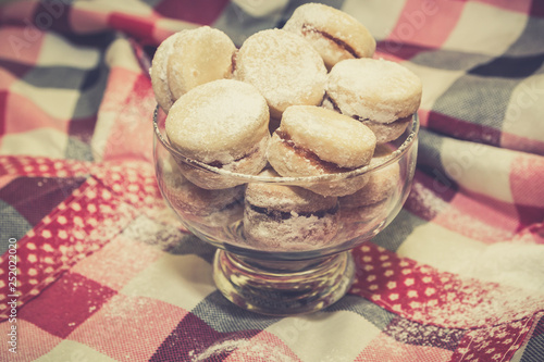 Vanilice, traditional Serbian small sandwich cookies in glass bowl. 