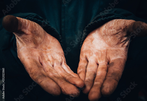 dirty hands of a man, a working man, a man drained his hands while working, a poor man