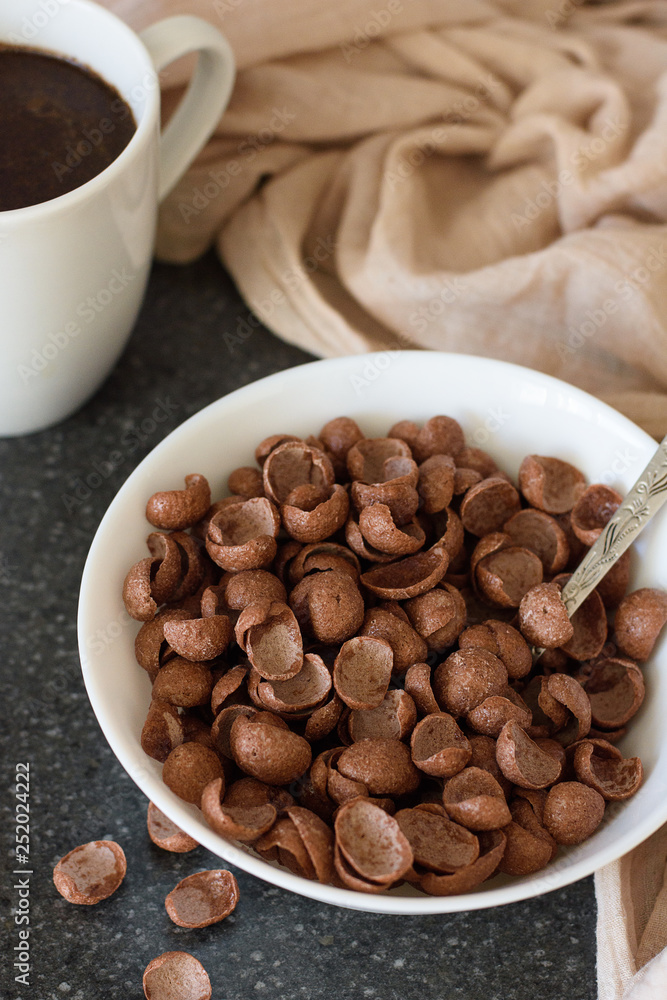 Chocolate cereal breakfast with a cup of coffee Chocolate cereal breakfast with a cup of coffee
