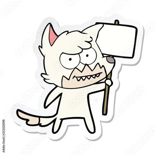 sticker of a cartoon grinning fox with protest sign