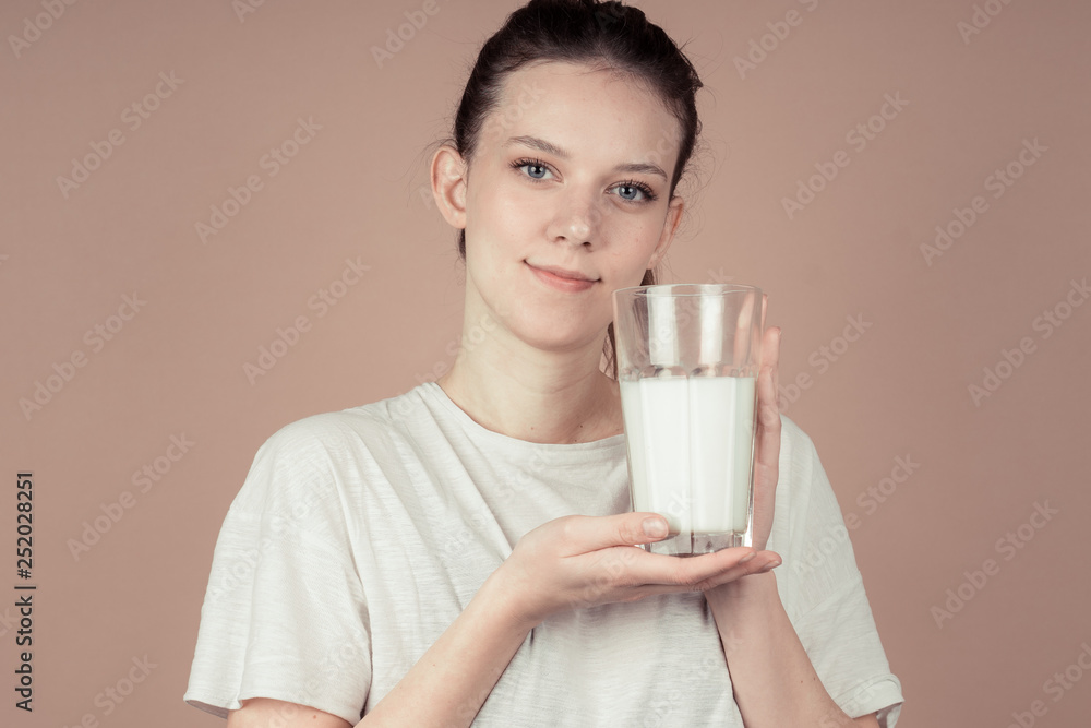 girl drinks milk and is happy girl drinks milk and is happy