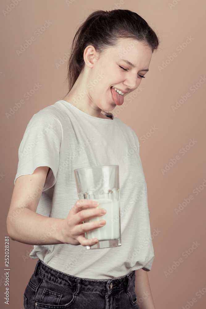 girl drinks milk and is happy girl drinks milk and is happy