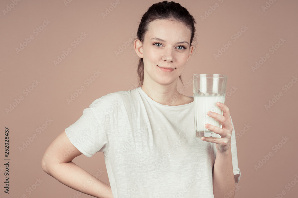 girl drinks milk and is happy girl drinks milk and is happy