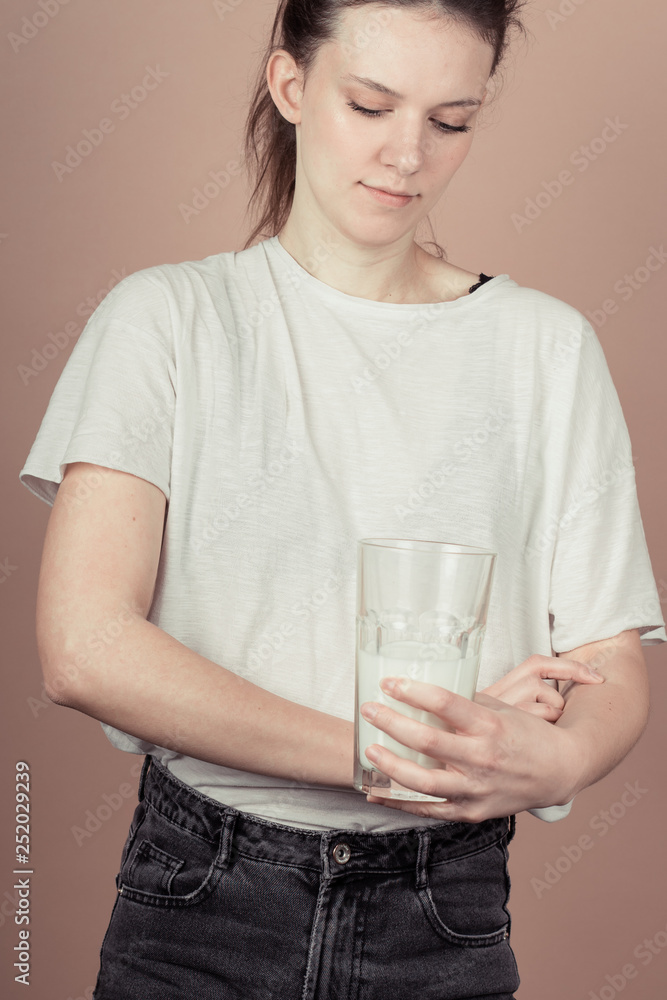 girl drinks milk and is happy girl drinks milk and is happy